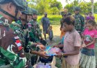 TNI Tebar Semangat Belajar di Pedalaman Papua: Seragam dan Tas untuk Masa Depan